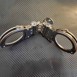 High-security handcuffs with triple wide hinge|® XLeathers|TV|Bondage BDSM